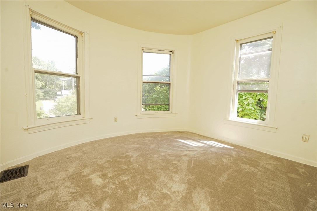 1720 Jacobs Road Youngstown, OH 44505 - Photo 6 of 18 Carpeted empty room featuring baseboards