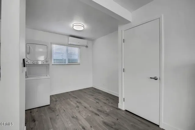 a kitchen with stainless steel appliances a refrigerator stove microwave and sink