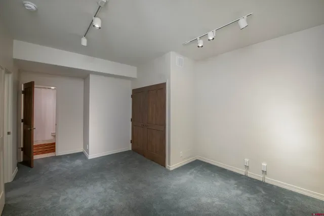 an empty room with closet