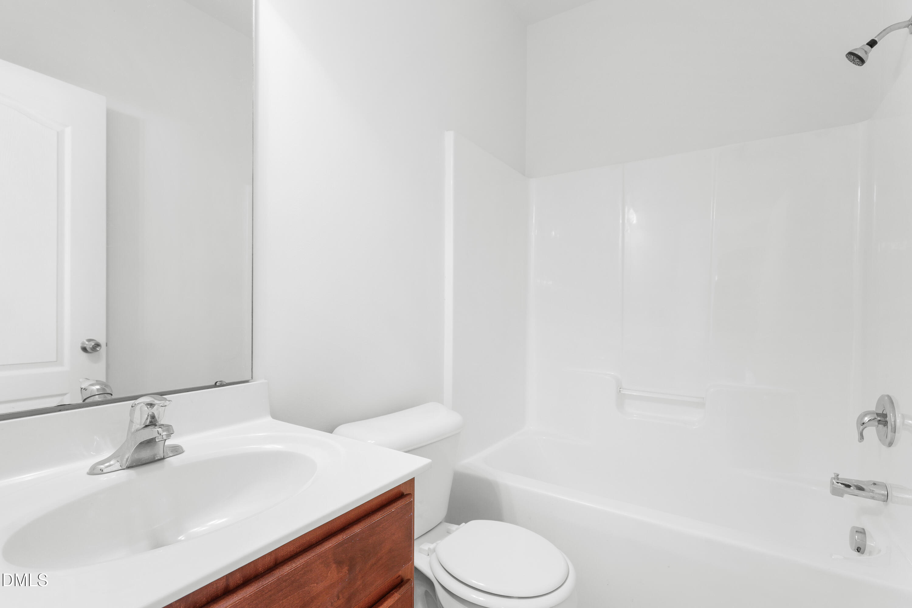 4400 Hillsgrove Road Wake Forest, NC 27587 - Photo 17 of 49 a bathroom with a sink toilet and bathtub