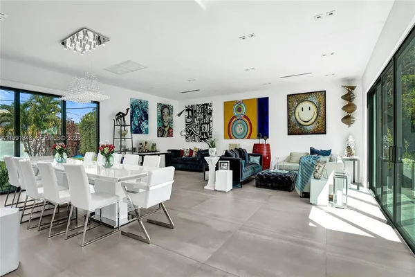 a bedroom with a bed and a table