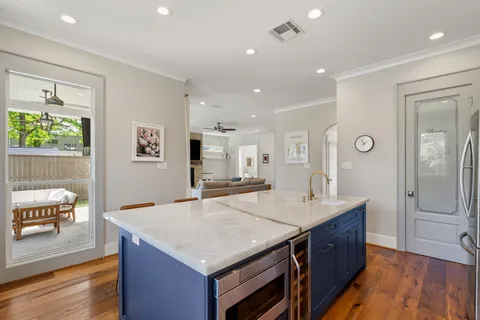 a view of a kitchen cabinets and a window