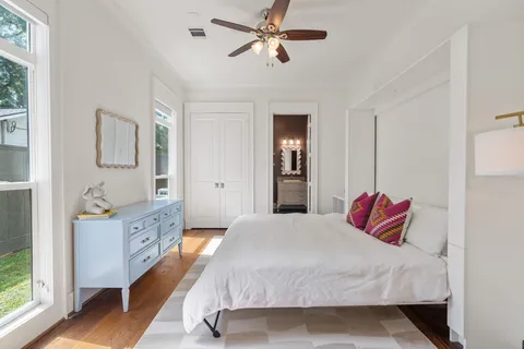 a view of an entryway with wooden floor