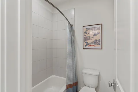 a outdoor space with patio couch and wooden floor