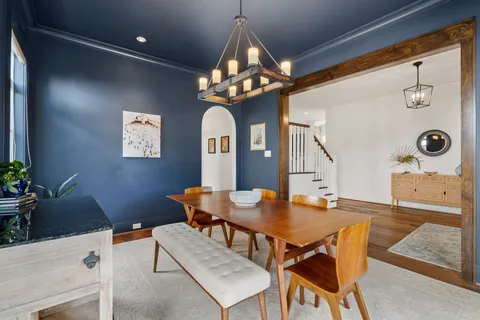 a living room with fireplace furniture and a flat screen tv