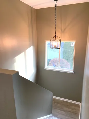 a room with window and entryway