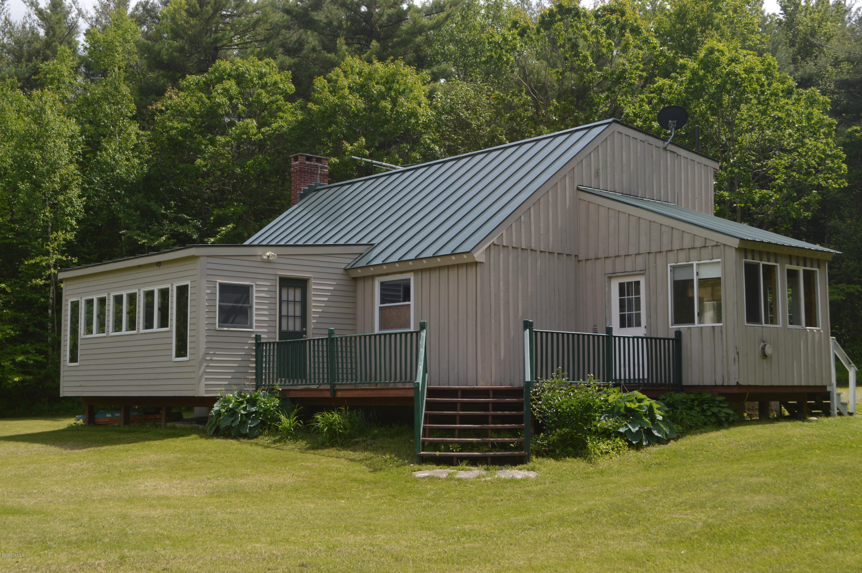 115 Webster Road Tyringham, MA 01264 - Photo 1 of 23 a aerial view of a house