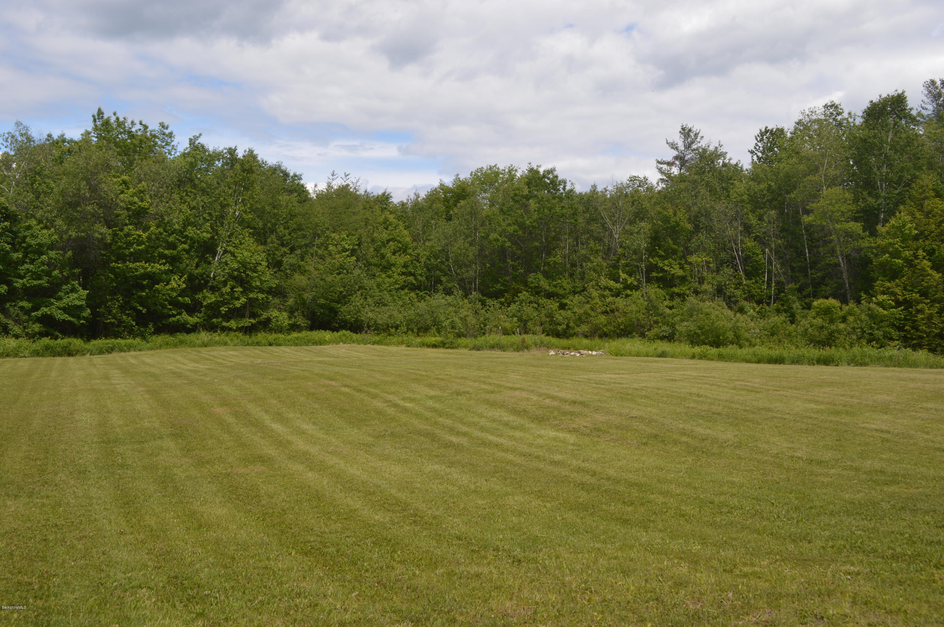 115 Webster Road Tyringham, MA 01264 - Photo 3 of 23 a view of an ocean and beach