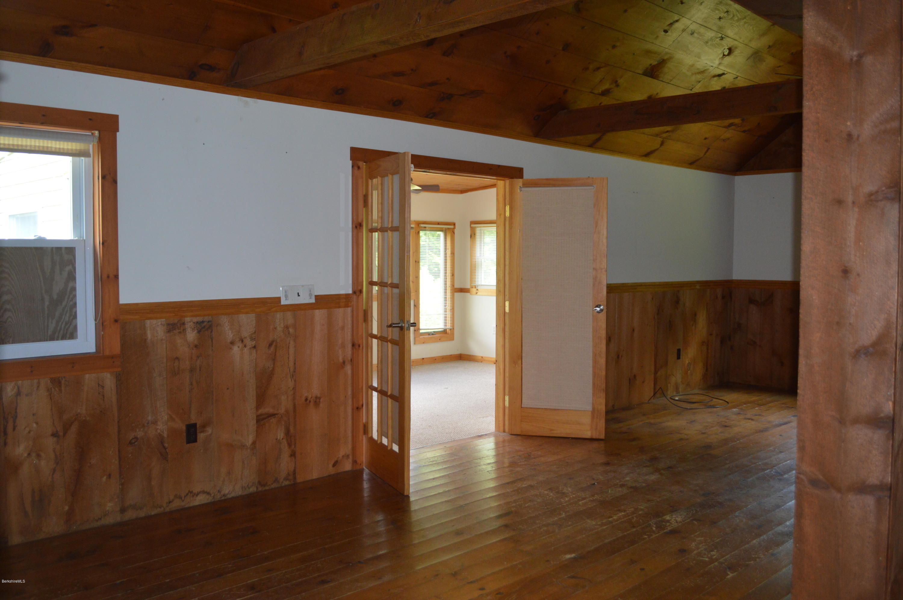 115 Webster Road Tyringham, MA 01264 - Photo 4 of 23 a view of hallway with wooden floor