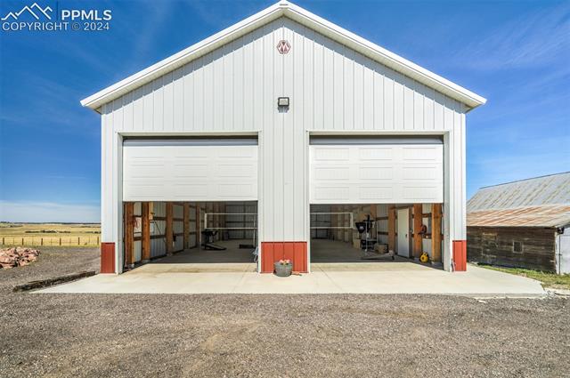 24076 Kobilan Road Calhan, CO 80808 - Photo 37 of 50 View of garage