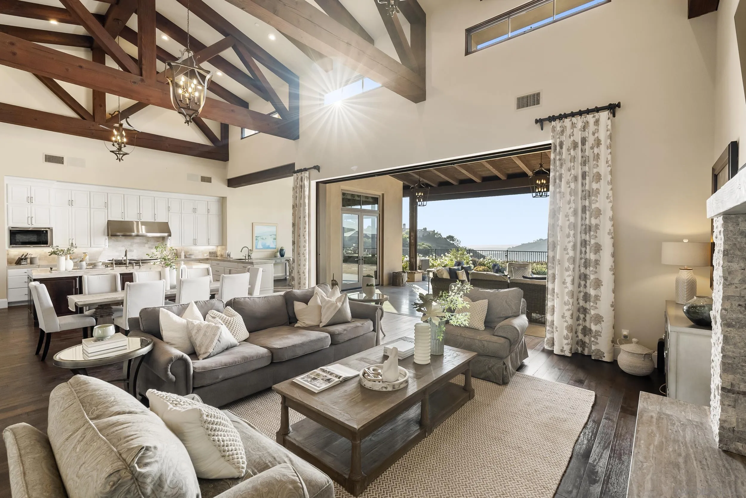 8046 El Cielo Rancho Santa Fe, CA 92067 - Photo 15 of 68 a living room with furniture and a large window