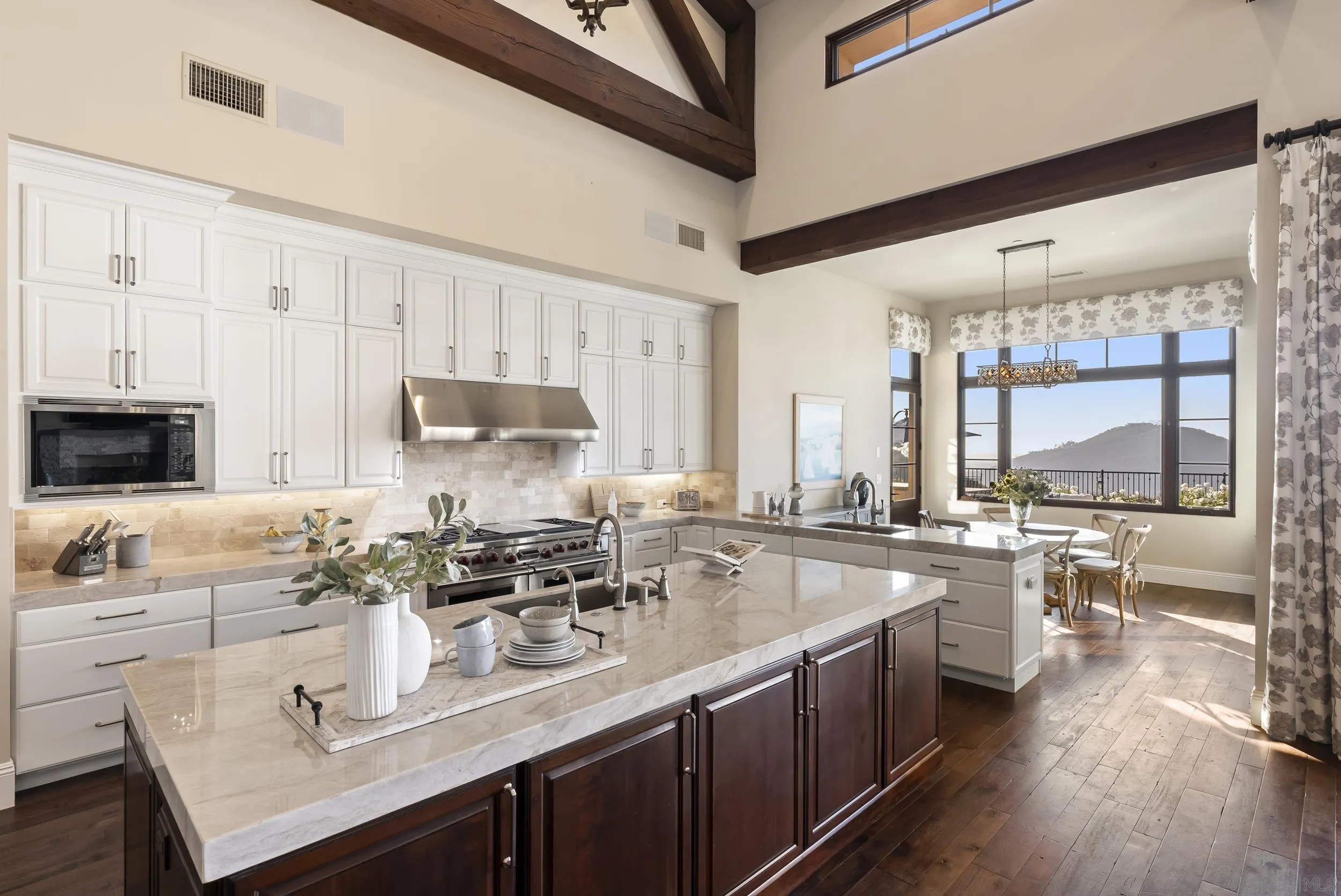 8046 El Cielo Rancho Santa Fe, CA 92067 - Photo 22 of 68 a kitchen with sink stove and cabinets