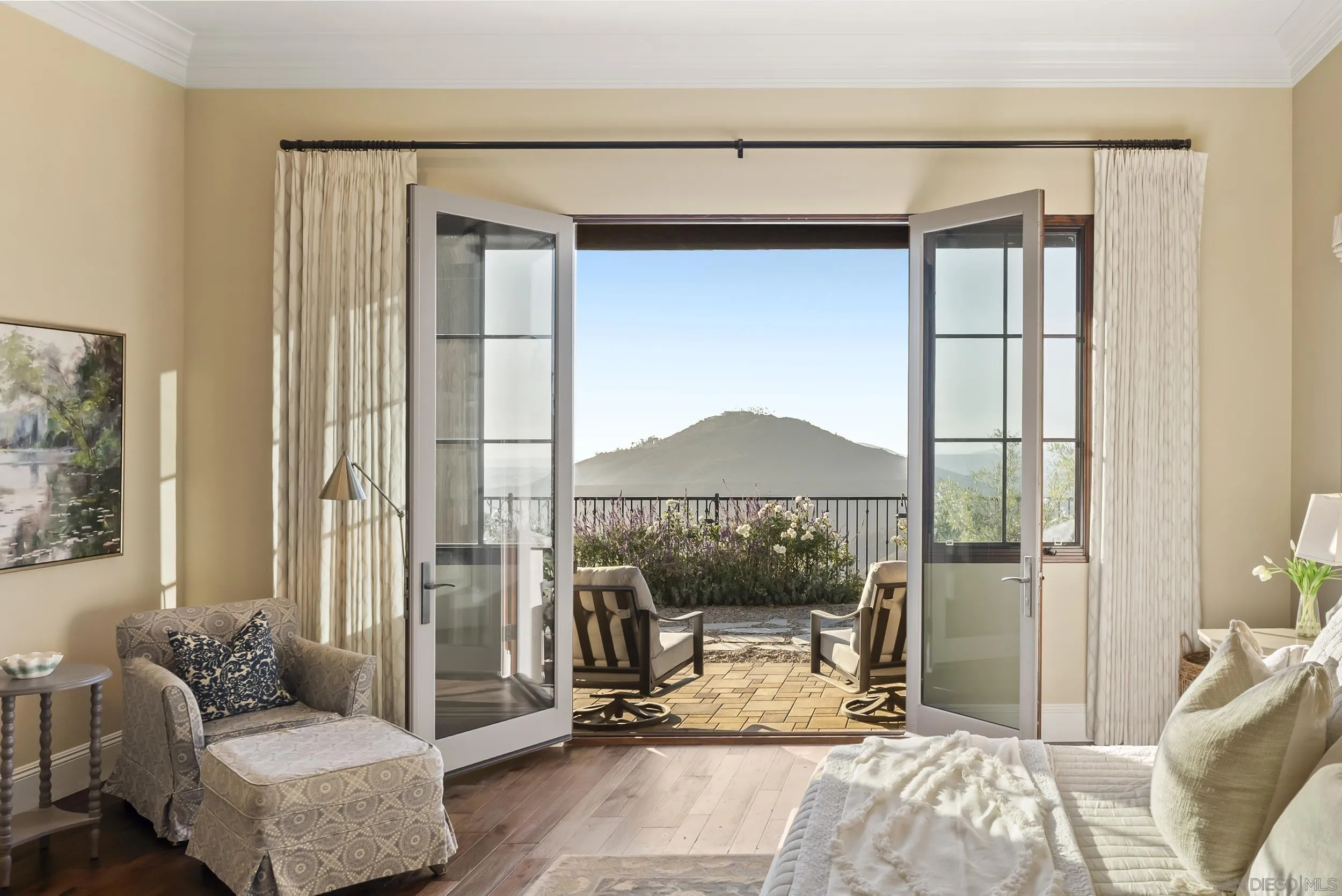 8046 El Cielo Rancho Santa Fe, CA 92067 - Photo 36 of 68 a living room with furniture and a floor to ceiling window