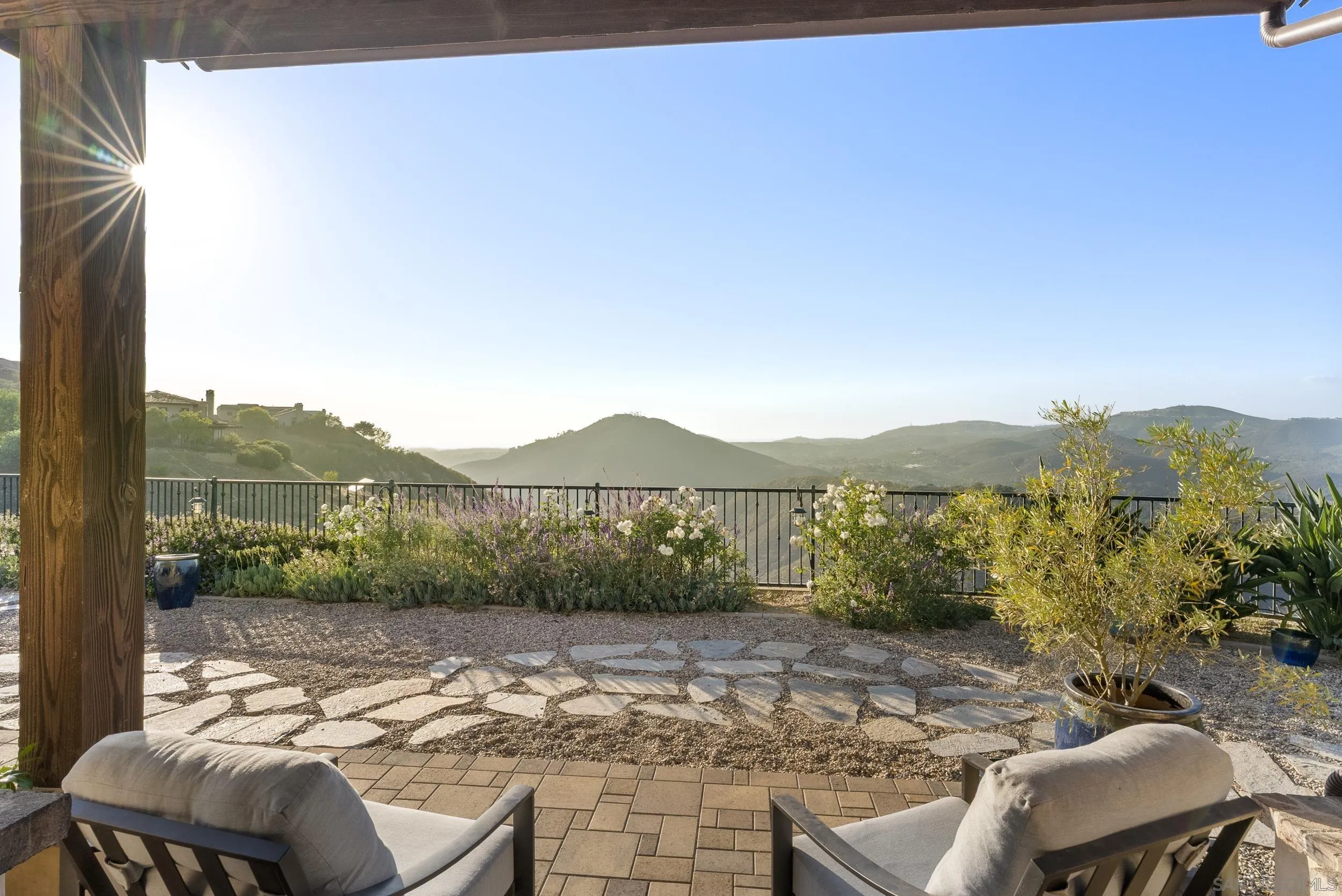 8046 El Cielo Rancho Santa Fe, CA 92067 - Photo 37 of 68 a view of chair and table in patio