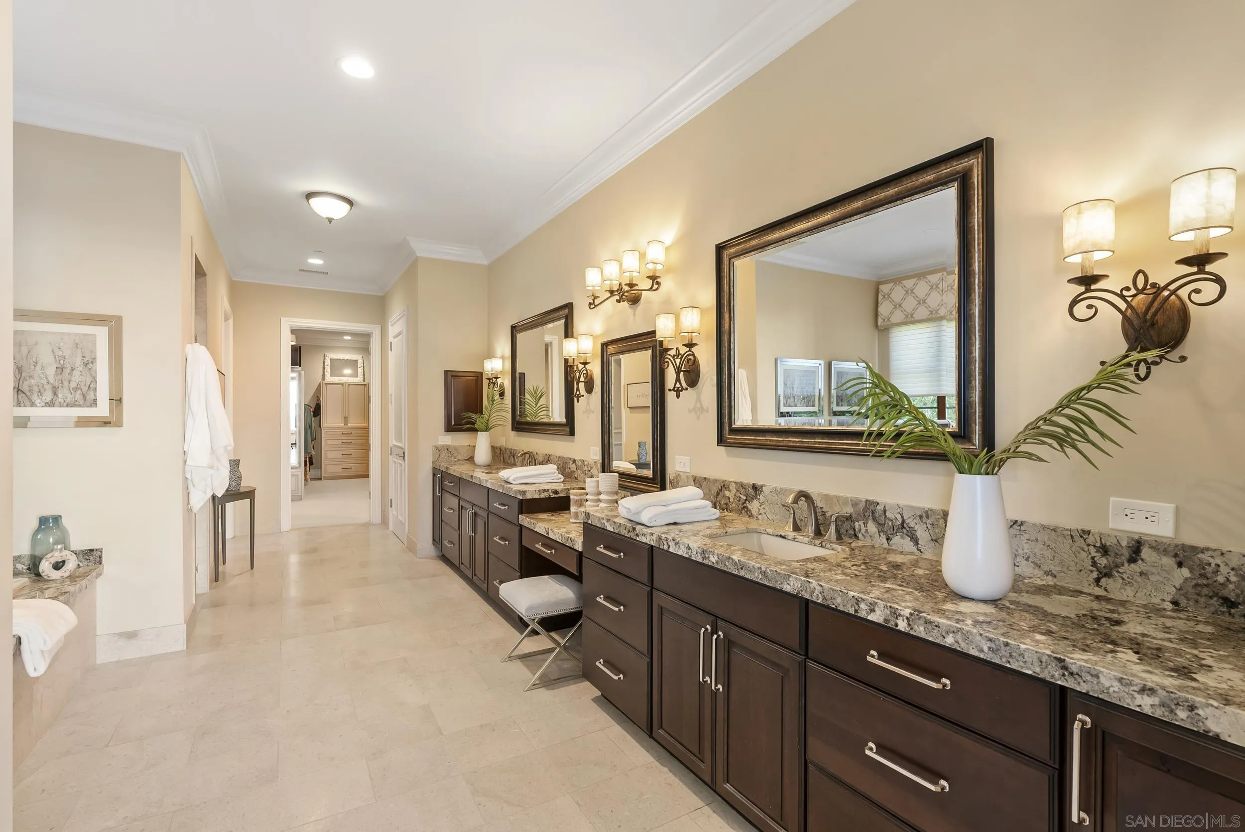 8046 El Cielo Rancho Santa Fe, CA 92067 - Photo 38 of 68 a spacious bathroom with a granite countertop sink mirror and bathtub