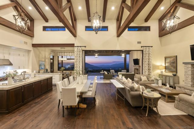a view of a living room and dining room