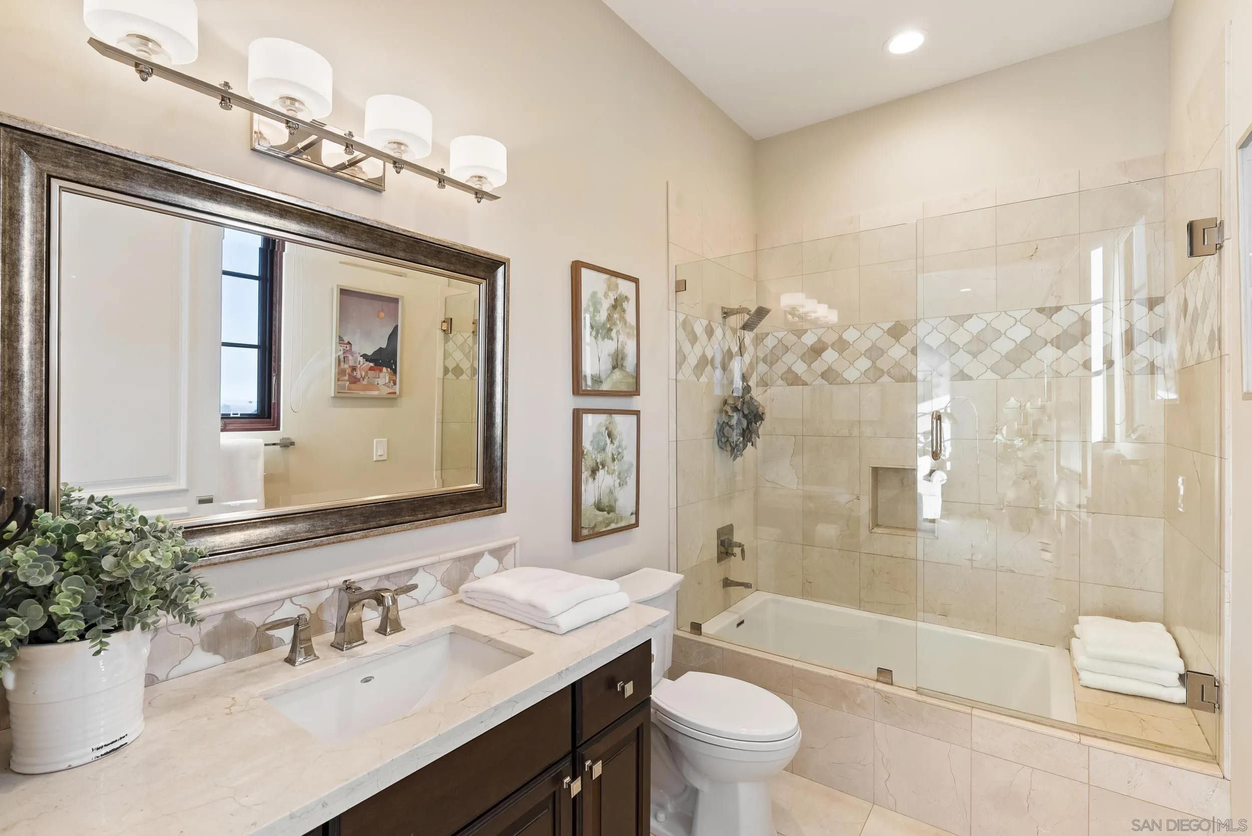 8046 El Cielo Rancho Santa Fe, CA 92067 - Photo 44 of 68 a bathroom with a bathtub shower sink mirror and toilet