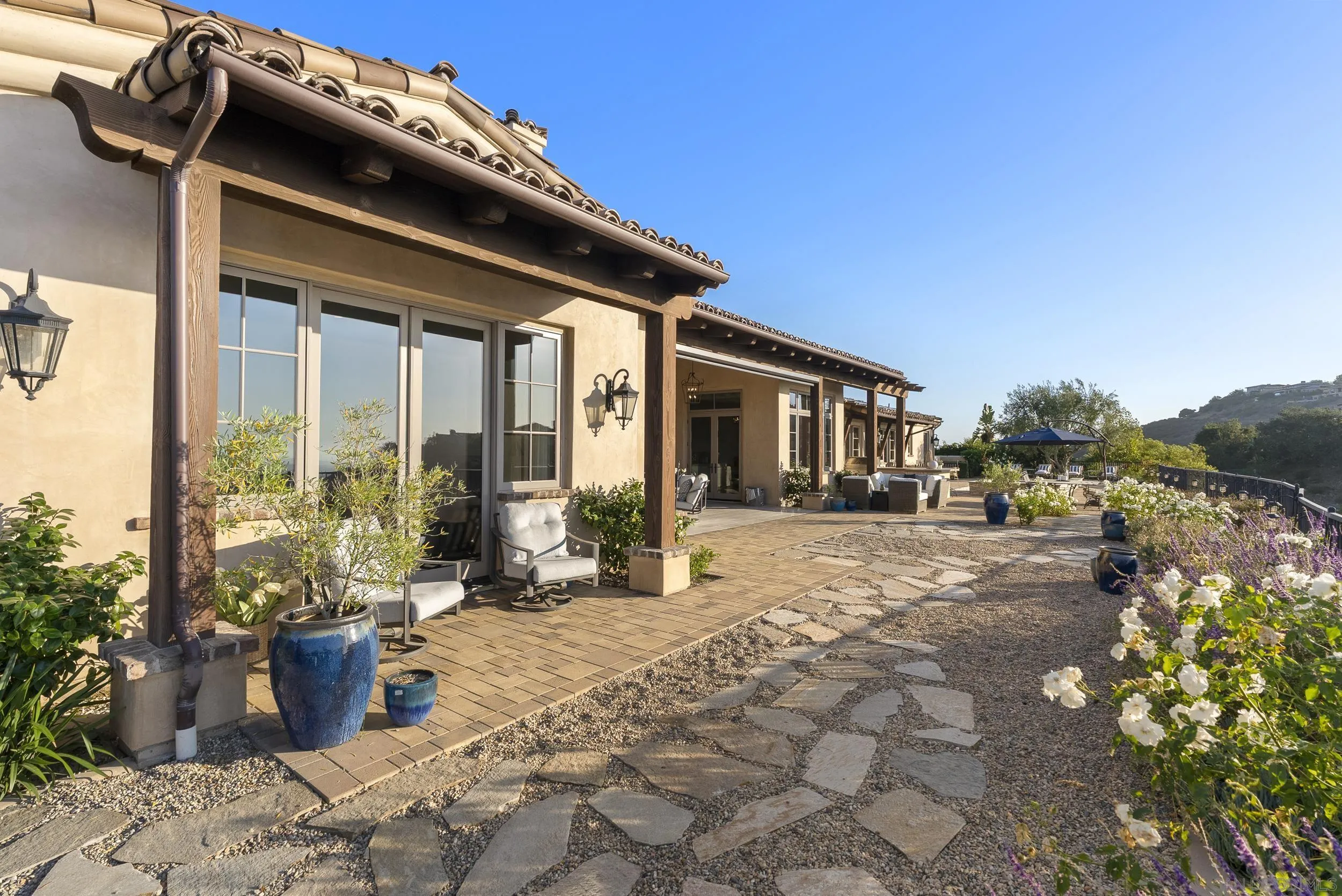 8046 El Cielo Rancho Santa Fe, CA 92067 - Photo 49 of 68 a view of a house with backyard and sitting area