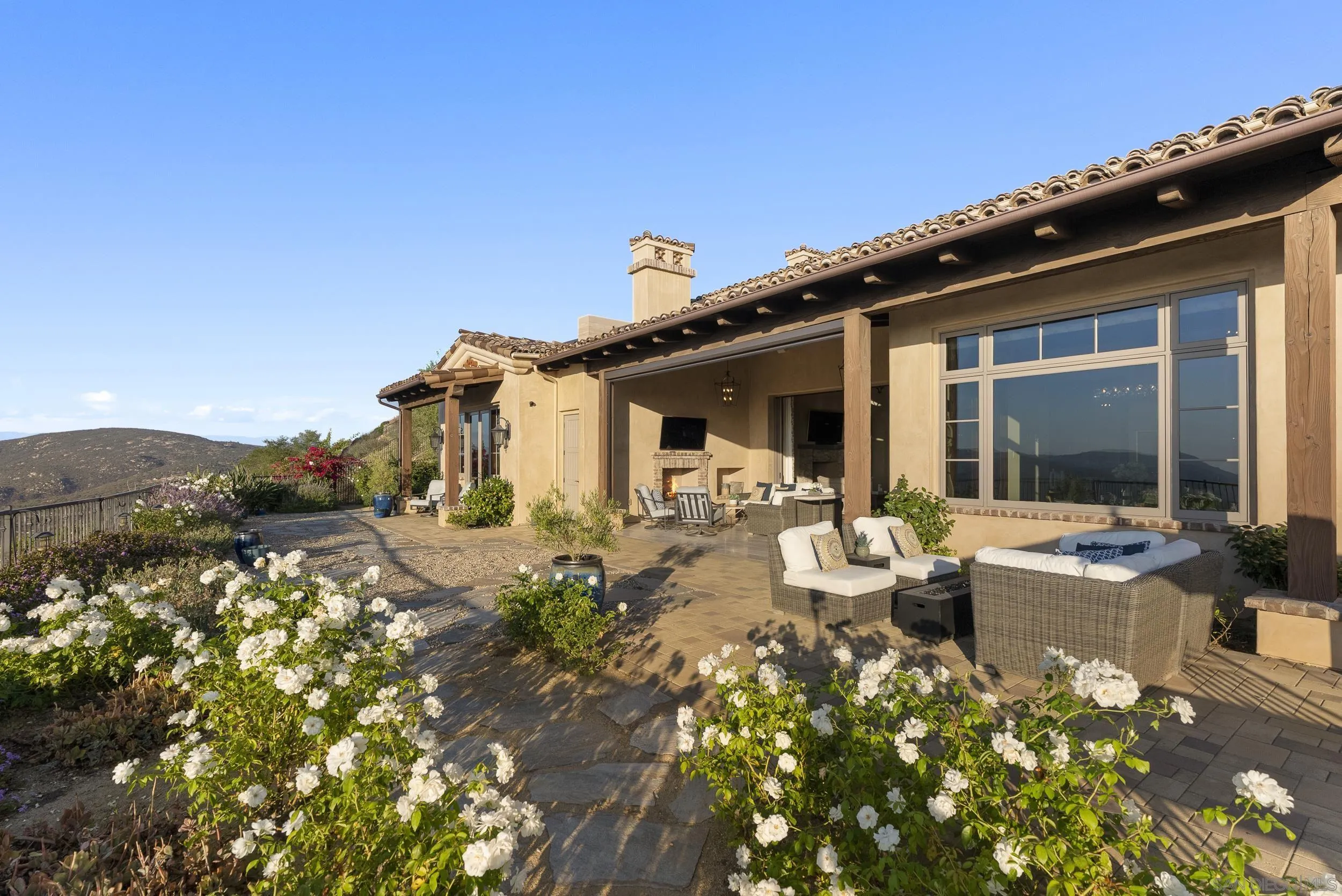 8046 El Cielo Rancho Santa Fe, CA 92067 - Photo 56 of 68 a front view of a house with sitting area