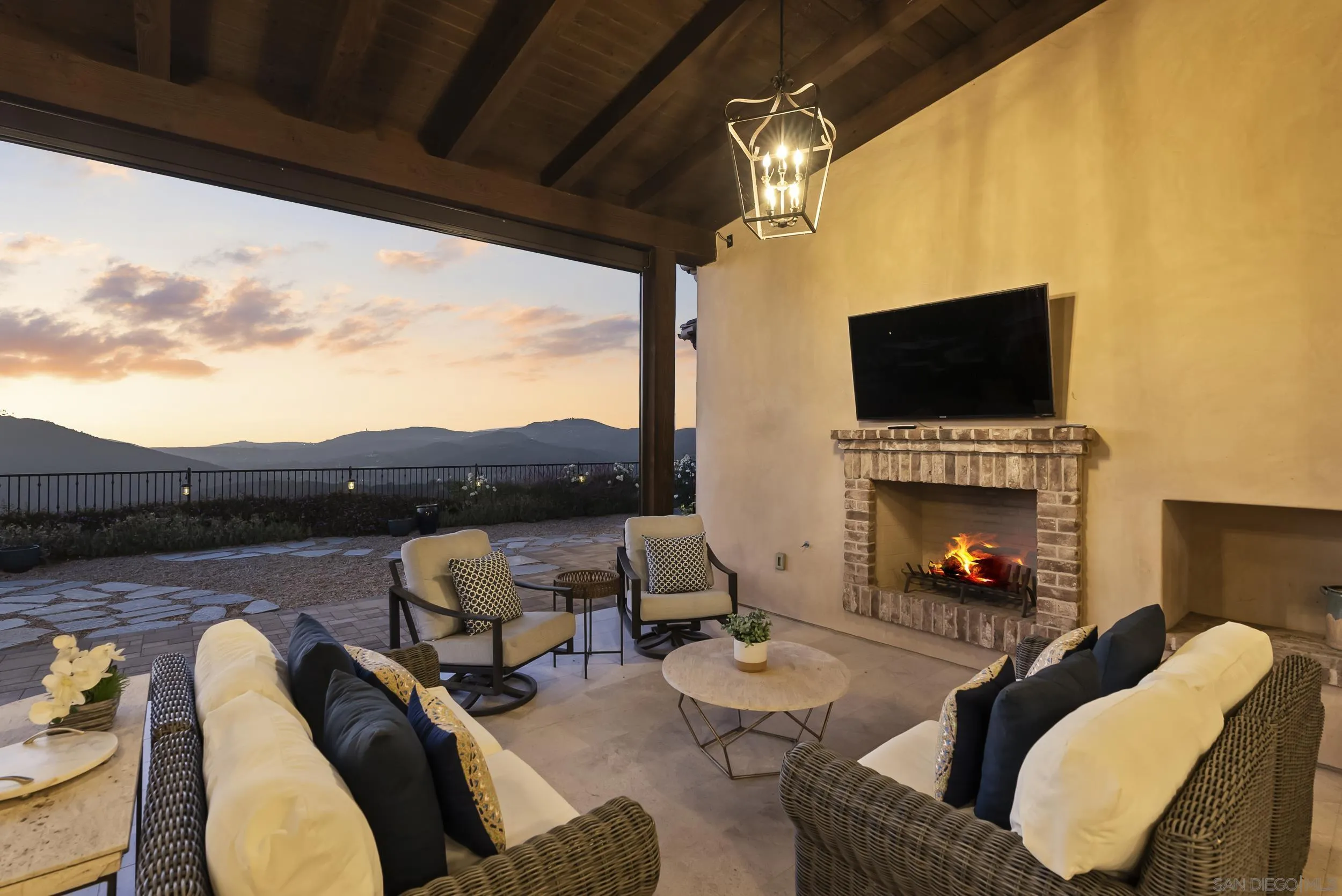8046 El Cielo Rancho Santa Fe, CA 92067 - Photo 65 of 68 a outdoor living space with furniture and a fireplace