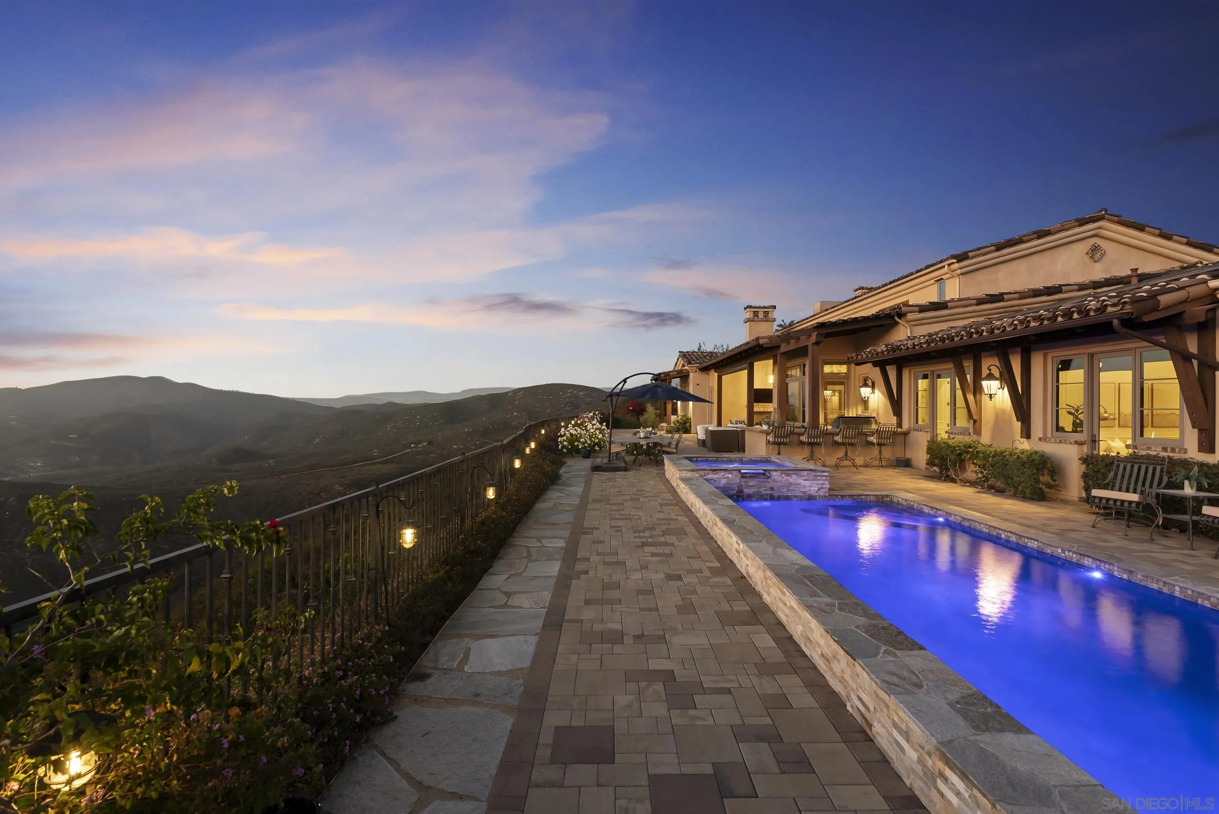 8046 El Cielo Rancho Santa Fe, CA 92067 - Photo 68 of 68 a house with swimming pool in front of it