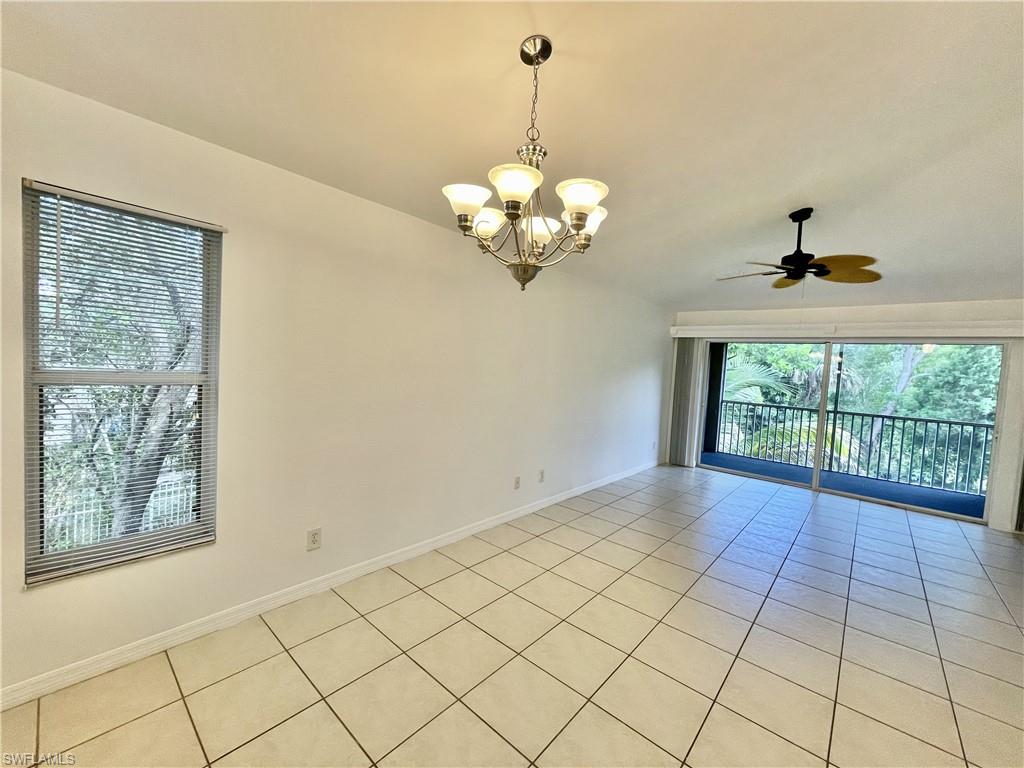 5470 16th Place Southwest, Unit 107 Naples, FL 34116 - Photo 11 of 31 a view of an empty room with a window