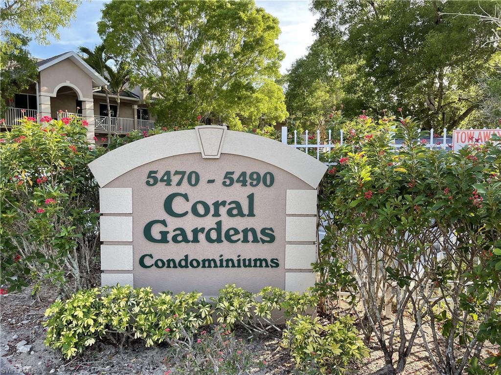 5470 16th Place Southwest, Unit 107 Naples, FL 34116 - Photo 31 of 31 a sign on the side of a building