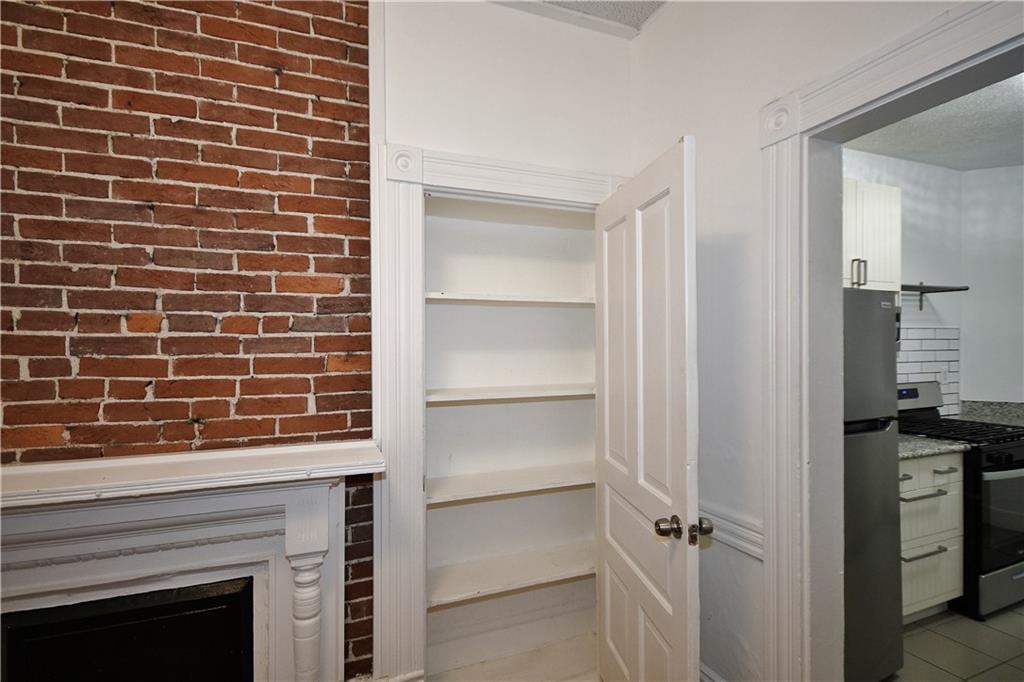 4627 Plummer Street Pittsburgh, PA 15201 - Photo 9 of 29 a view of storage and utility room with washer and dryer