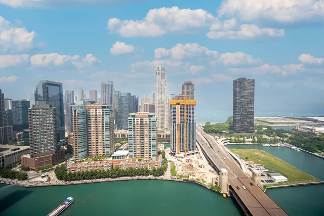 a view of a city with tall buildings