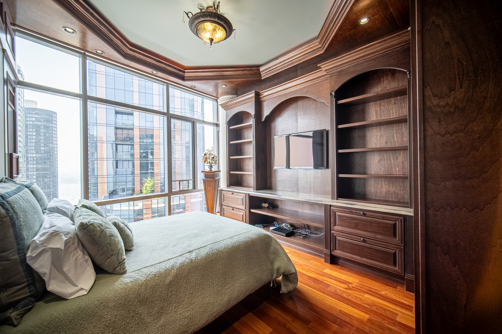 450 East Waterside Drive, Unit 3302 Chicago, IL 60601 - Photo 25 of 52 a bedroom with a bed and a large window with the balcony view