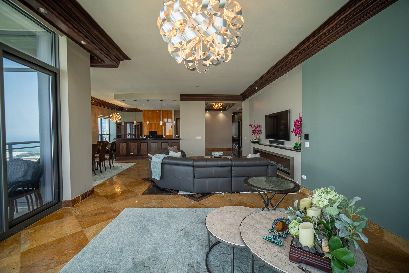 450 East Waterside Drive, Unit 3302 Chicago, IL 60601 - Photo 8 of 52 a living room with furniture and a flat screen tv