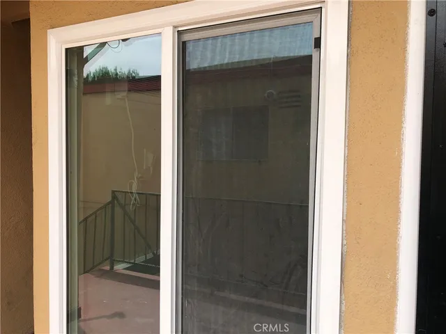 a view of a bathroom from a hallway