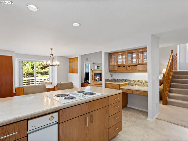a kitchen that has a lot of cabinets in it