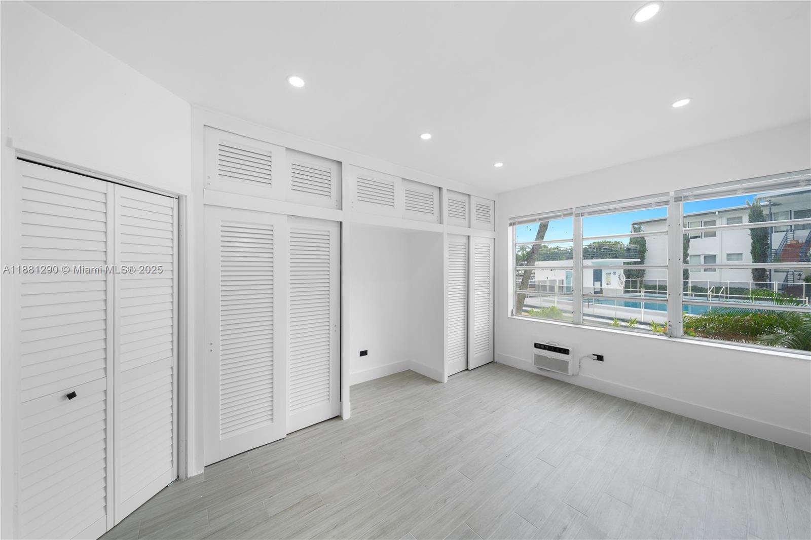 4710 Pine Tree Drive, Unit 31 Miami Beach, FL 33140 - Photo 8 of 25 a view of an empty room with a window