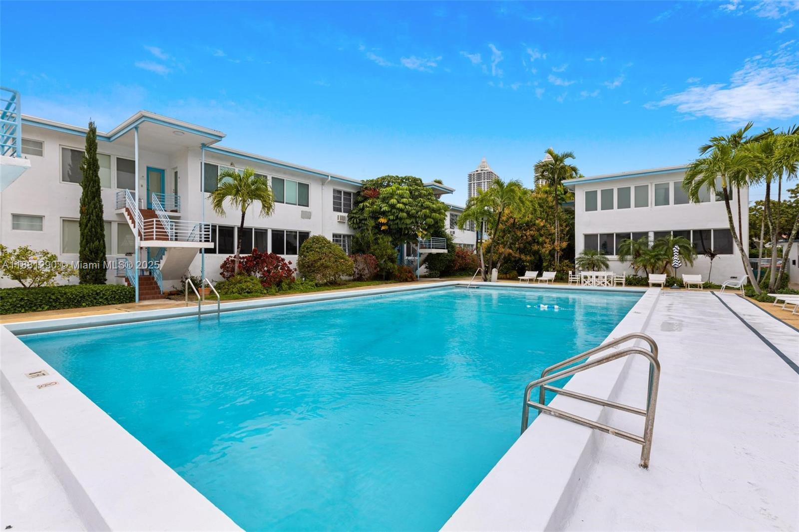 4710 Pine Tree Drive, Unit 31 Miami Beach, FL 33140 - Photo 9 of 25 a view of a house with a swimming pool