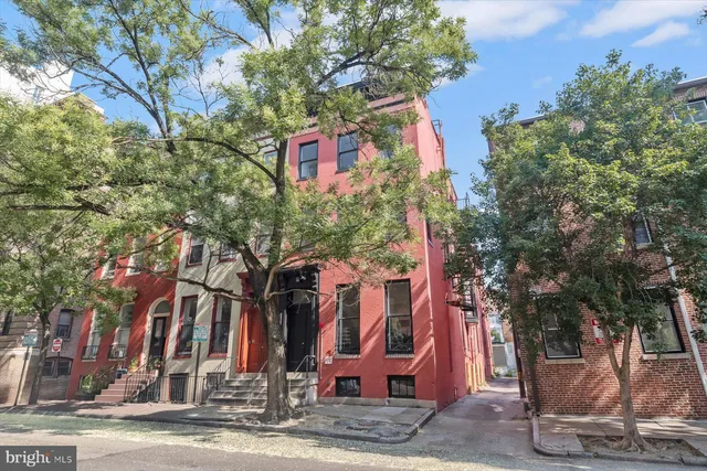 a view of a house with snow on the wall
