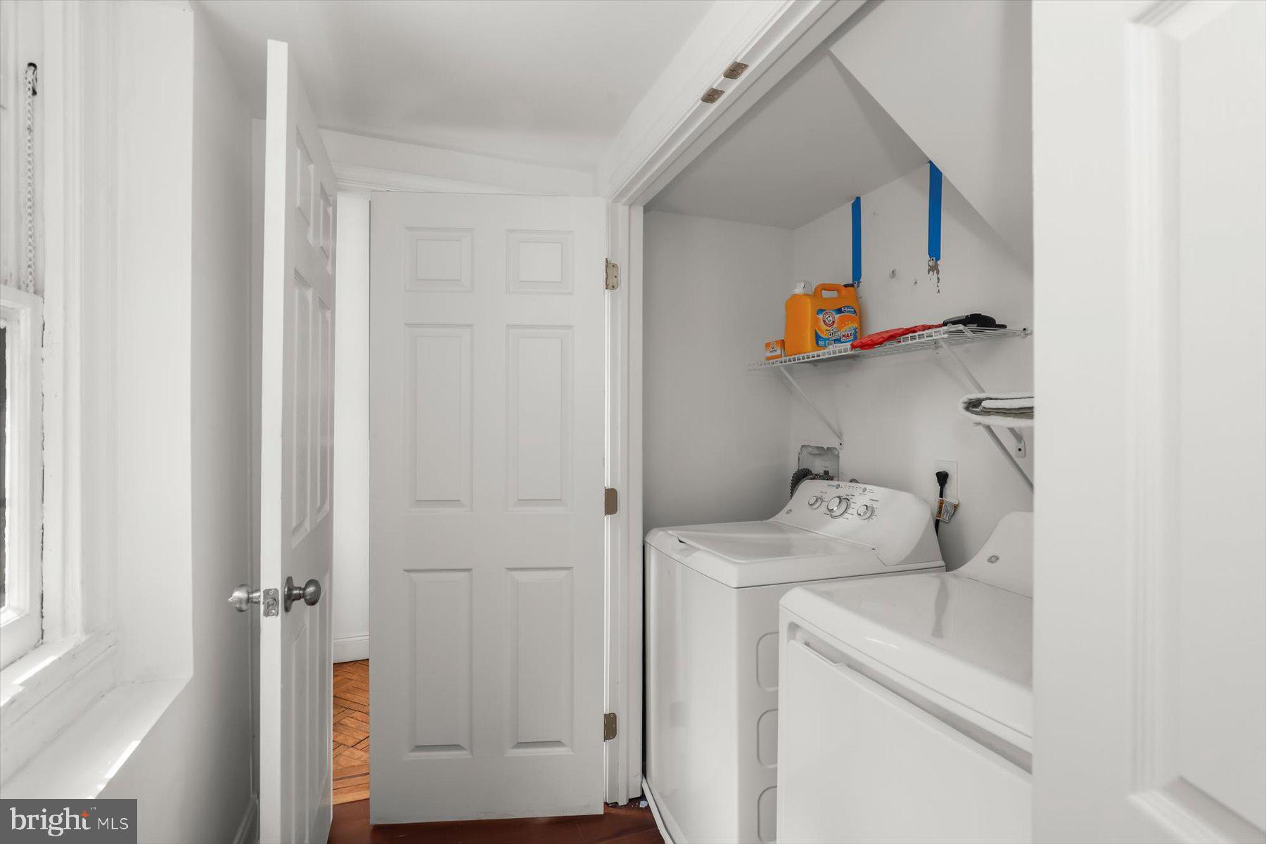 14 East Read Street Baltimore, MD 21202 - Photo 14 of 61 a utility room with dryer and washer