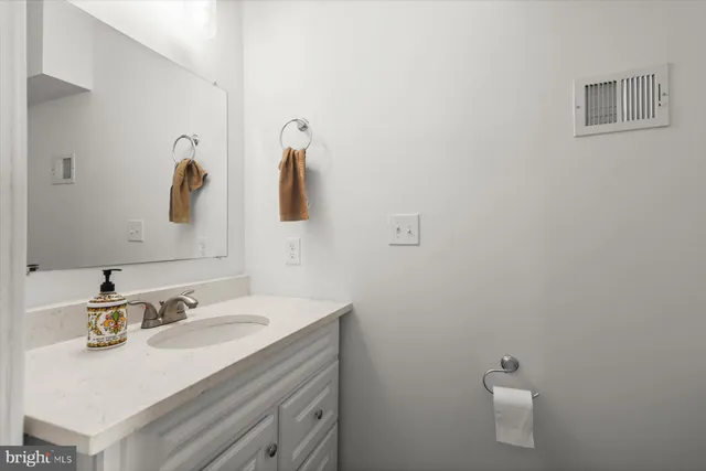 a view of a hallway with washer and dryer
