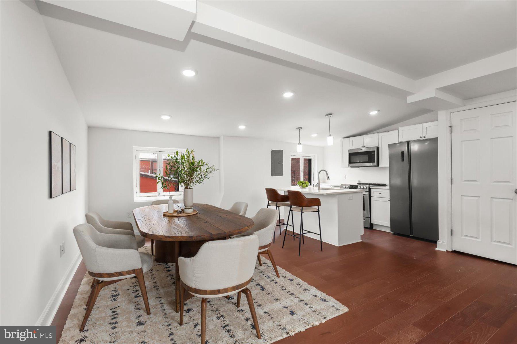 14 East Read Street Baltimore, MD 21202 - Photo 51 of 61 a view of a dining room with furniture and wooden floor