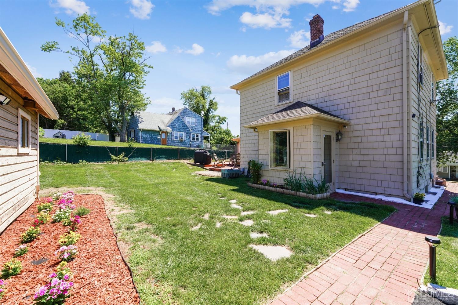 282 Greenbrook Road Plainfield, NJ 07060 - Photo 14 of 15 a front view of a house with garden