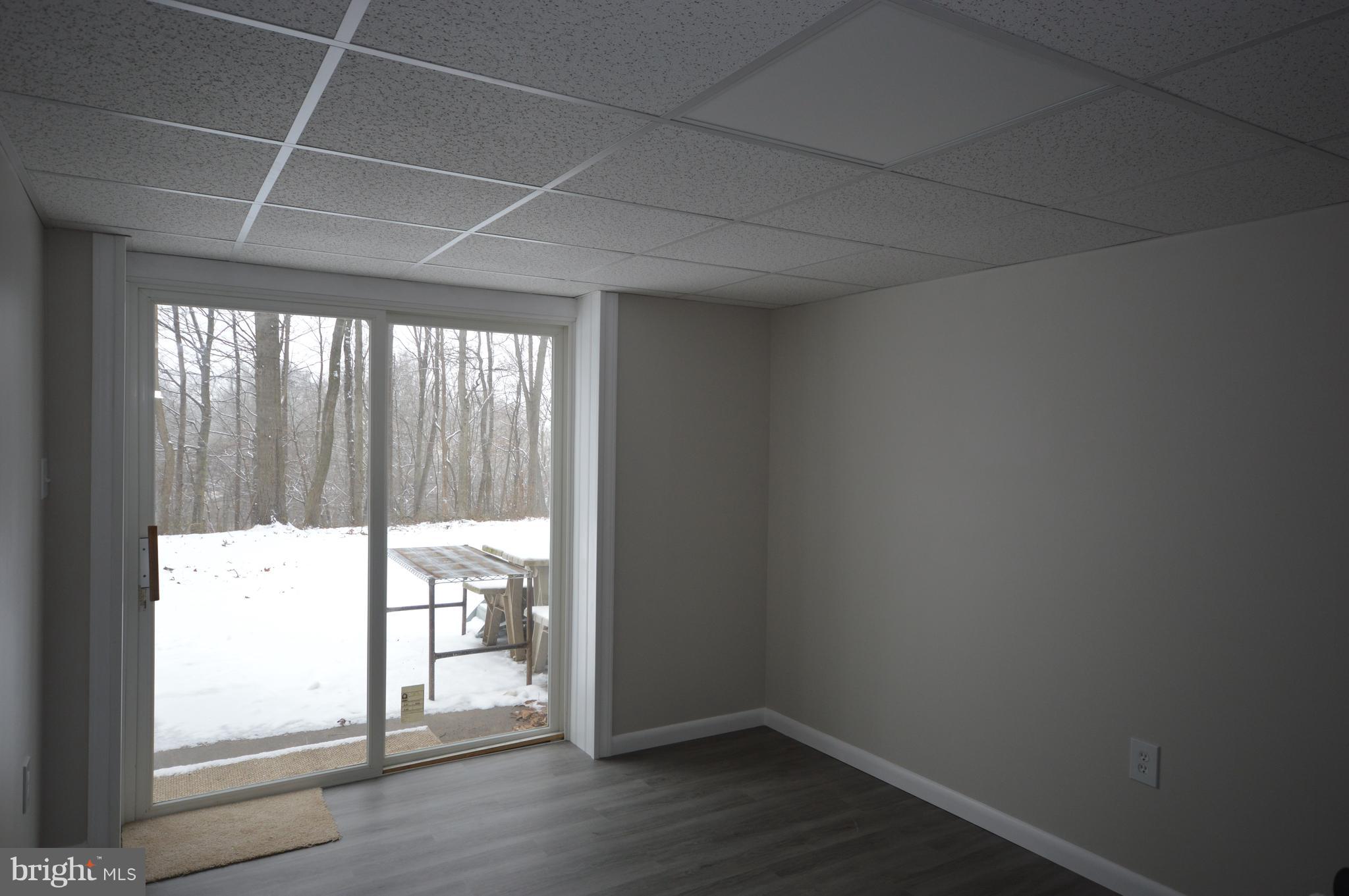 326 Brick Road Oxford, PA 19363 - Photo 22 of 26 tv room lower level