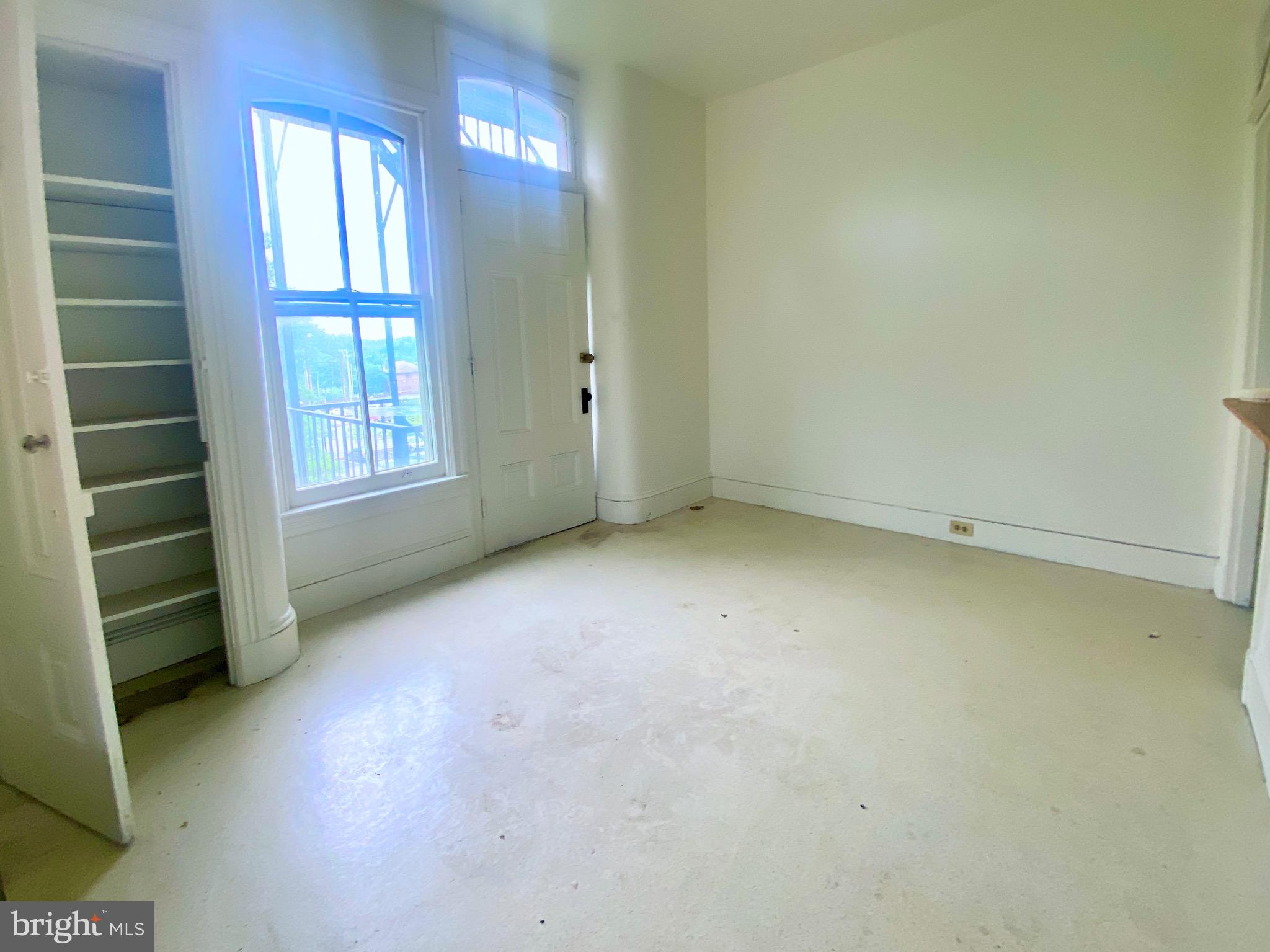 26 South 2nd Street, Unit 2 Columbia, PA 17512 - Photo 12 of 14 an empty room with a empty space and windows