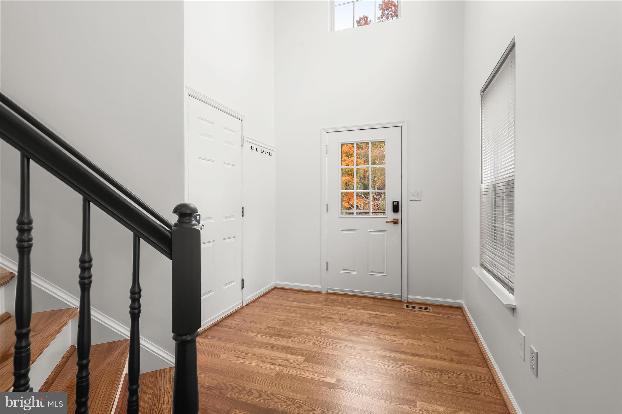 147 Idlewild Road Severna Park, MD 21146 - Photo 13 of 36 a view of an entryway with wooden floor and stairs