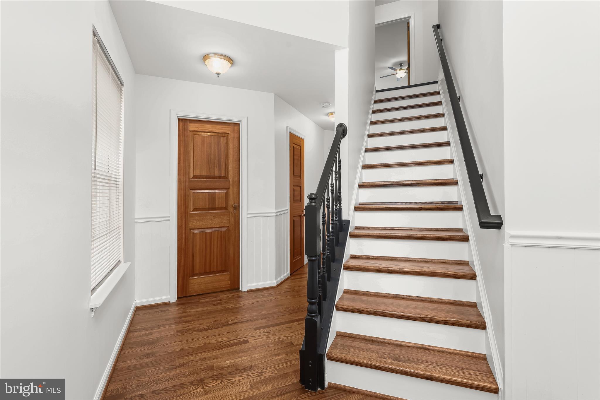 147 Idlewild Road Severna Park, MD 21146 - Photo 14 of 36 a view of entryway with wooden floor and stairs