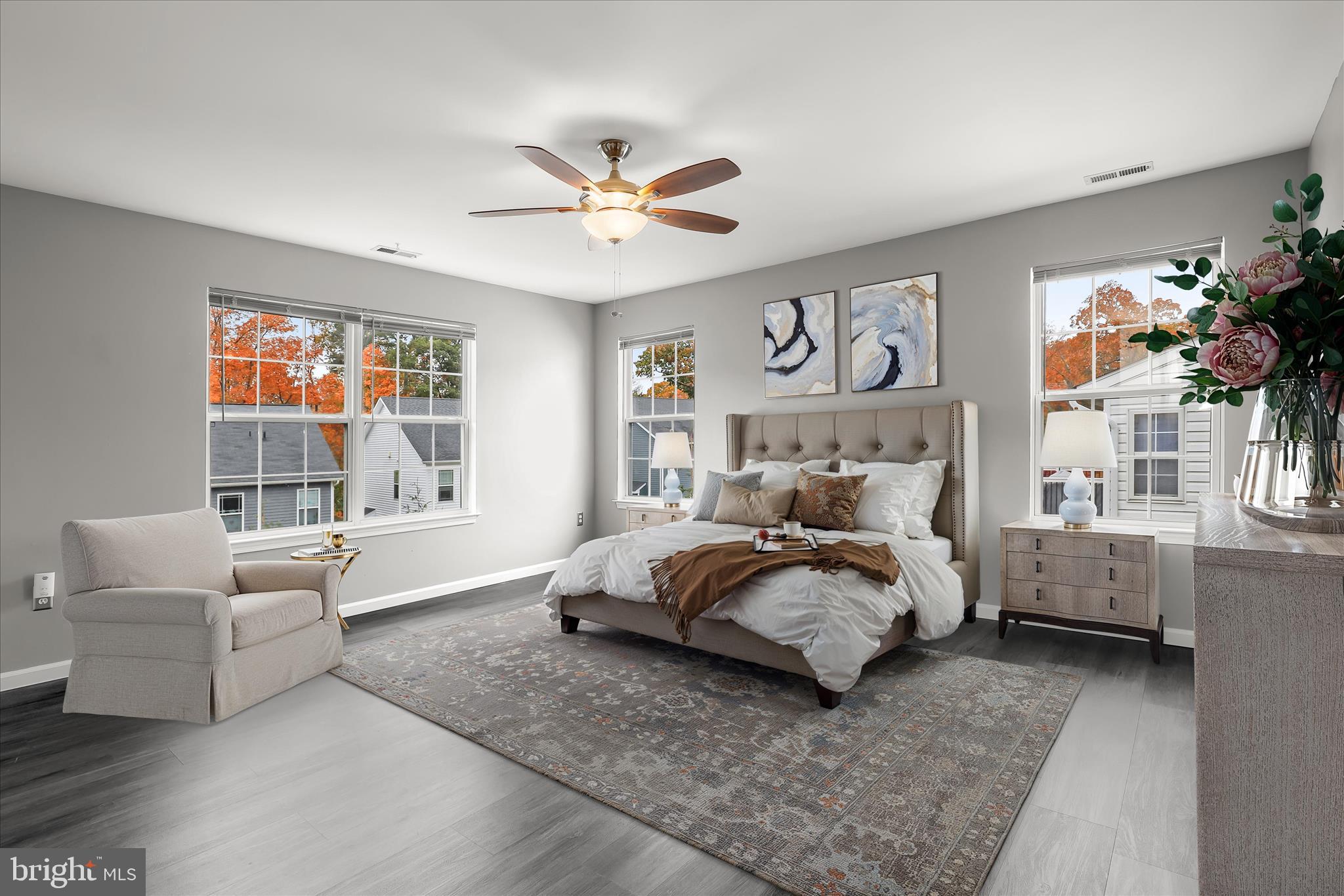 147 Idlewild Road Severna Park, MD 21146 - Photo 15 of 36 a spacious bedroom with a bed and a couch