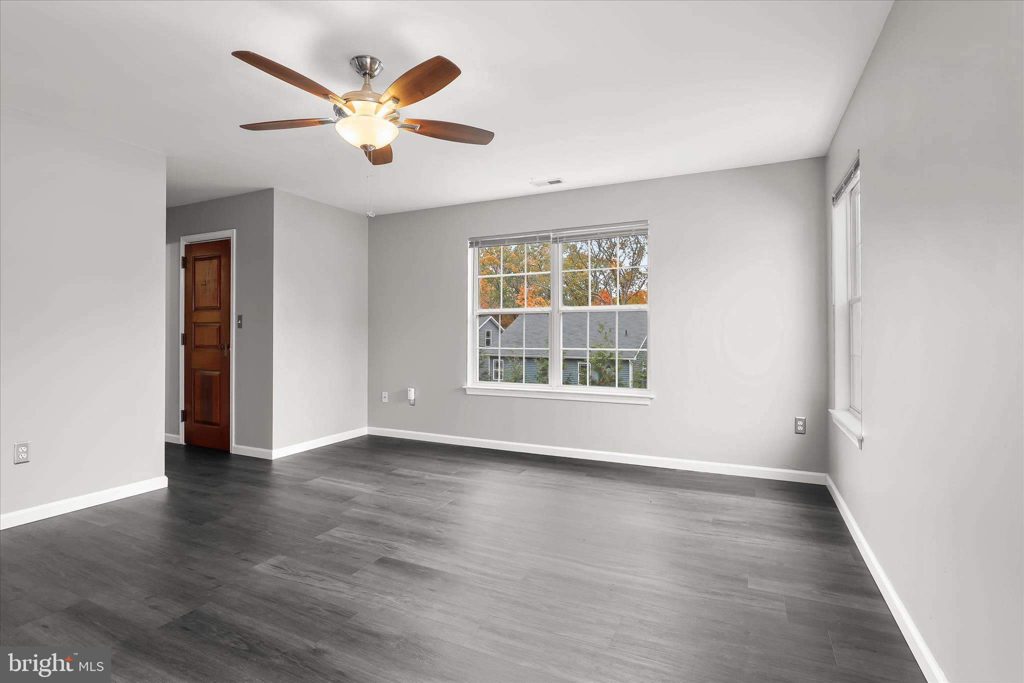 147 Idlewild Road Severna Park, MD 21146 - Photo 17 of 36 wooden floor in an empty room with a window