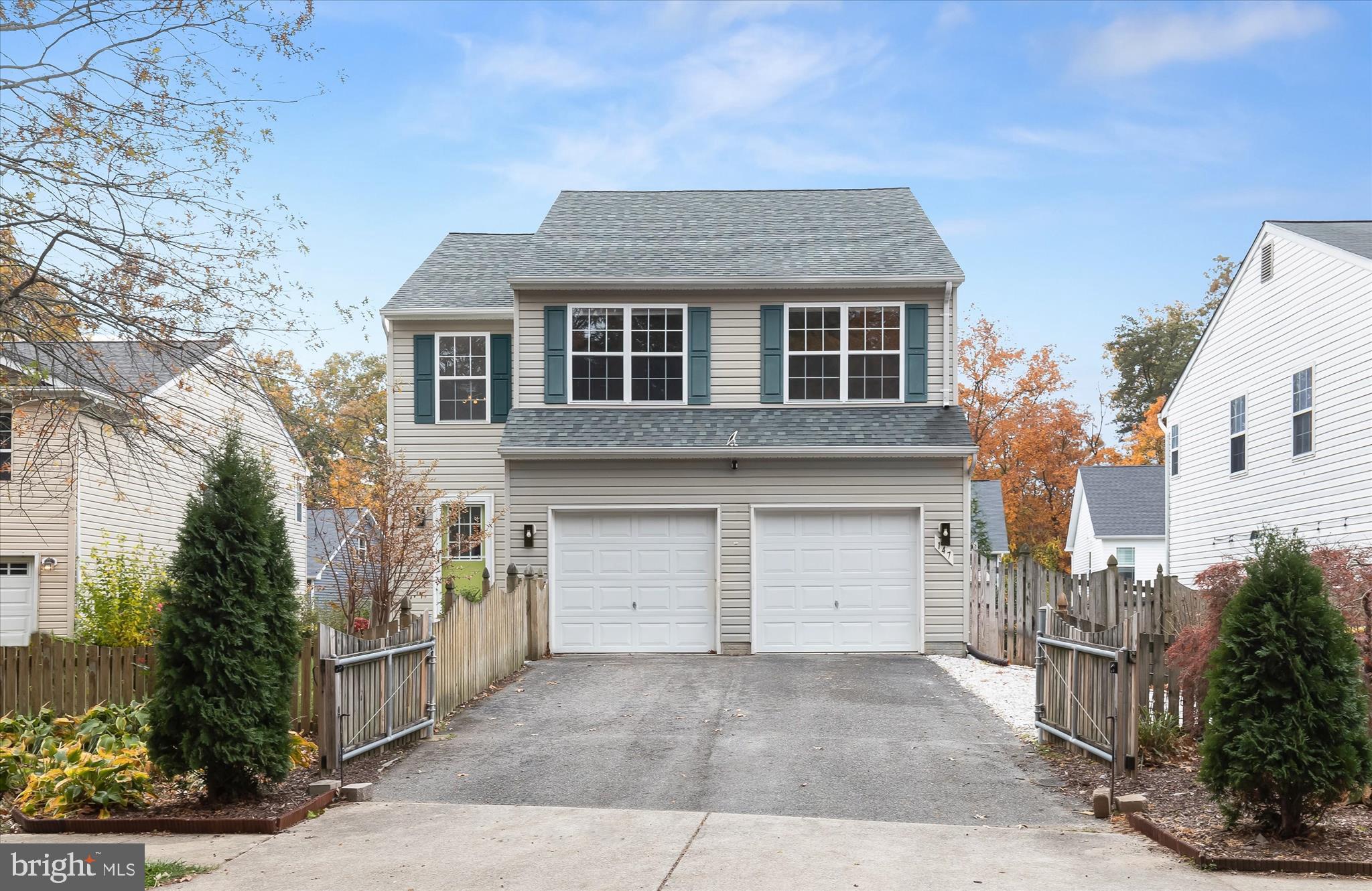 147 Idlewild Road Severna Park, MD 21146 - Photo 27 of 36 a front view of a house with a yard and garage