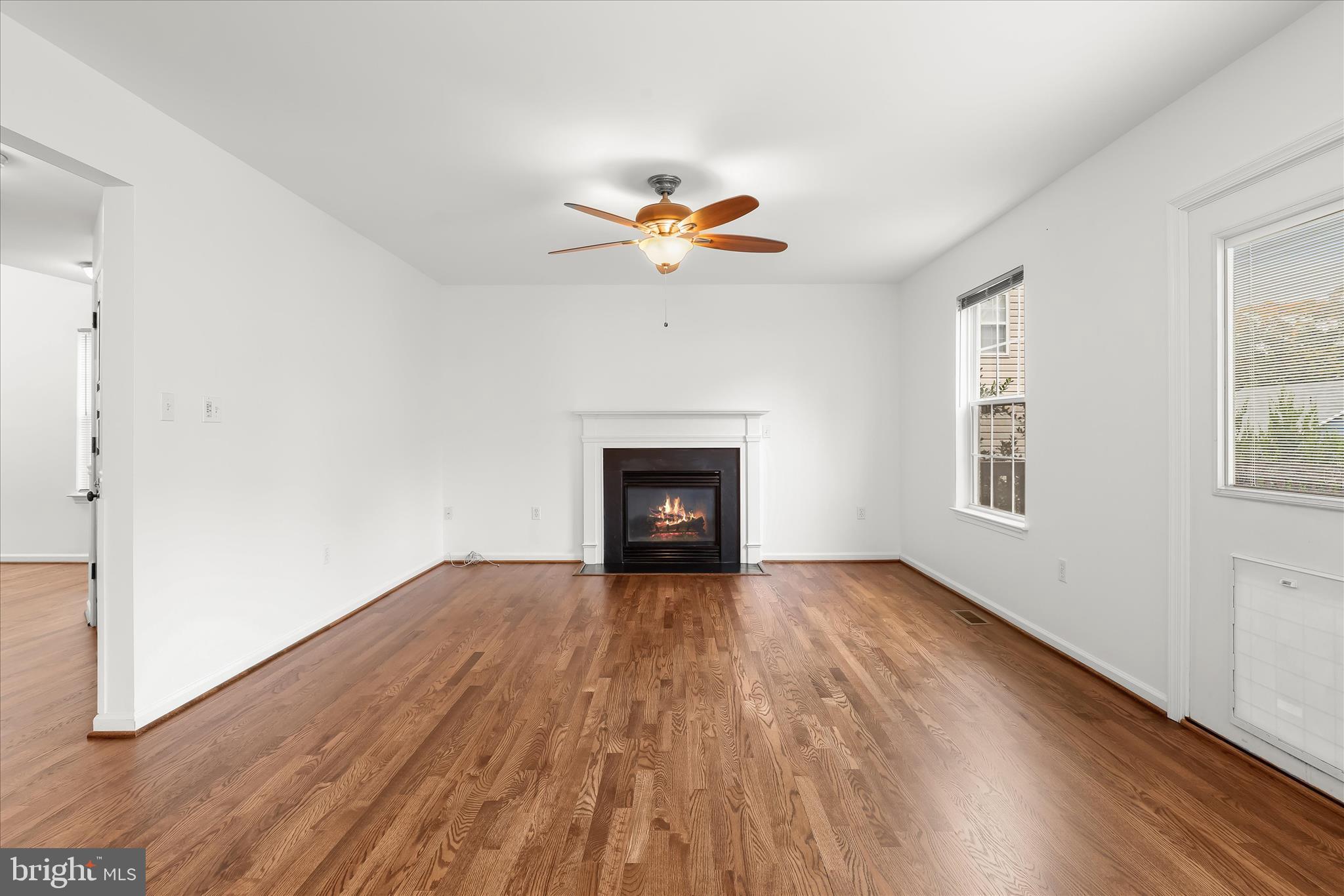 147 Idlewild Road Severna Park, MD 21146 - Photo 3 of 36 wooden floor in an empty room with a window