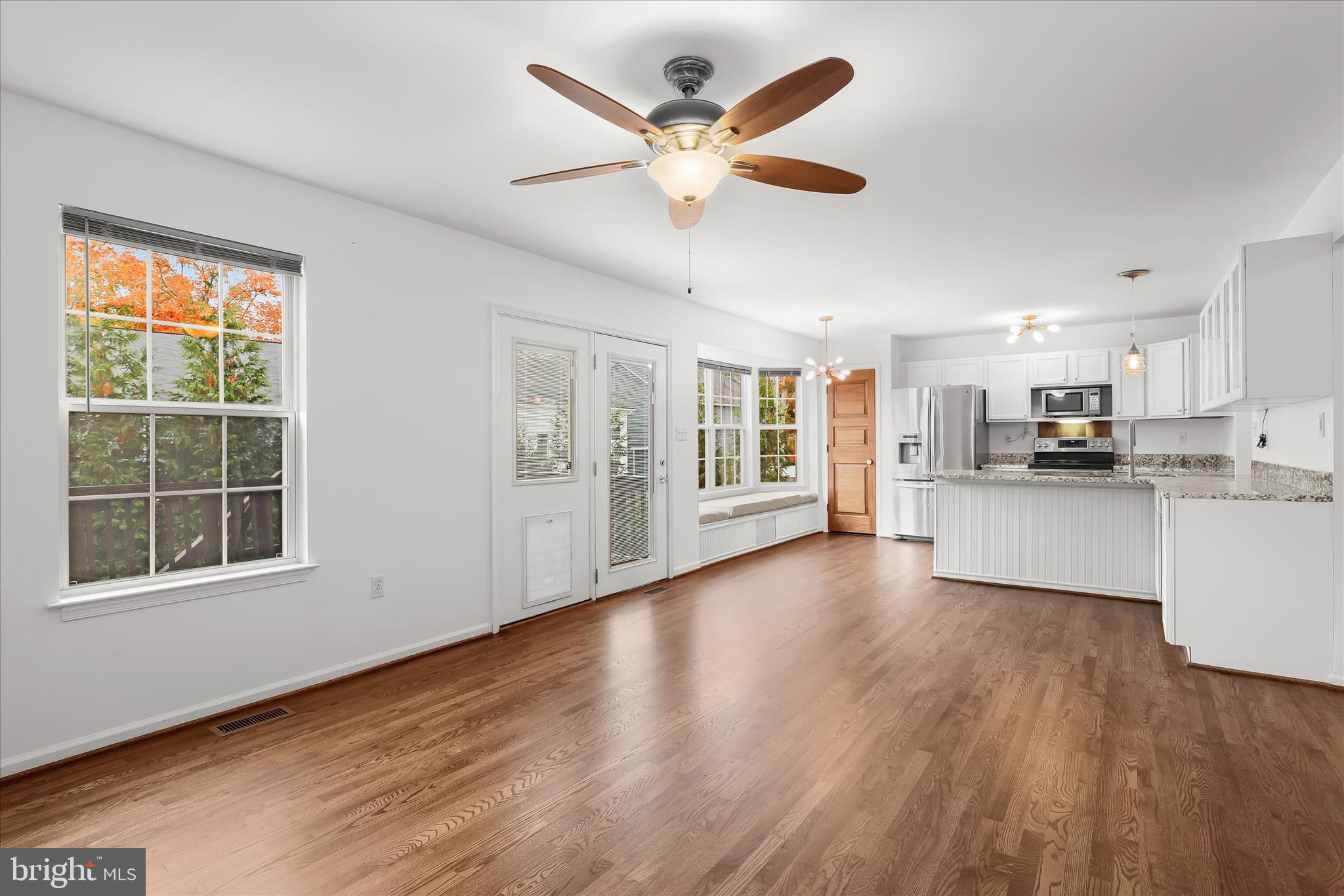147 Idlewild Road Severna Park, MD 21146 - Photo 4 of 36 a view of an empty room with window and wooden floor