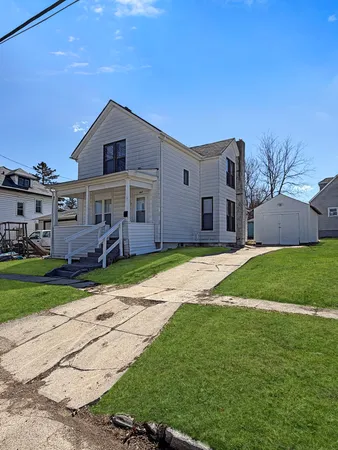 a view of a house with a big yard